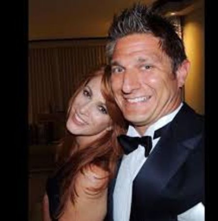 Angie Everhart with her husband Carl Ferro
